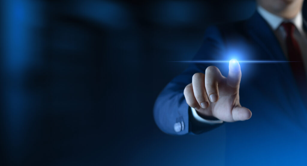 Az Bütçeyle Daha Fazla Görünürlük: KOBİ’ler İçin Akıllı Reklam Stratejileri businessman pressing button on virtual screen. man pointing on futuristic interface. space for text